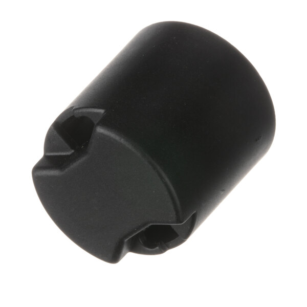 A close-up of a black plastic Rational Protecting Cap with a hole in it.