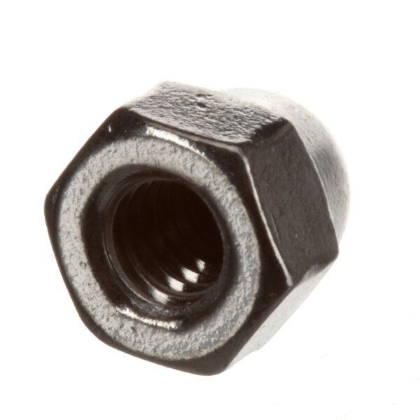 A close-up of a Blakeslee 8140 nut with a black metal cap.