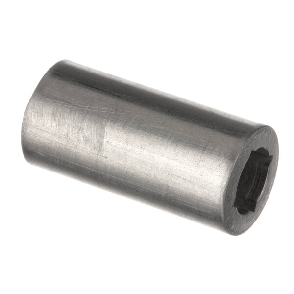 A close-up of a metal cylinder with a threaded socket.