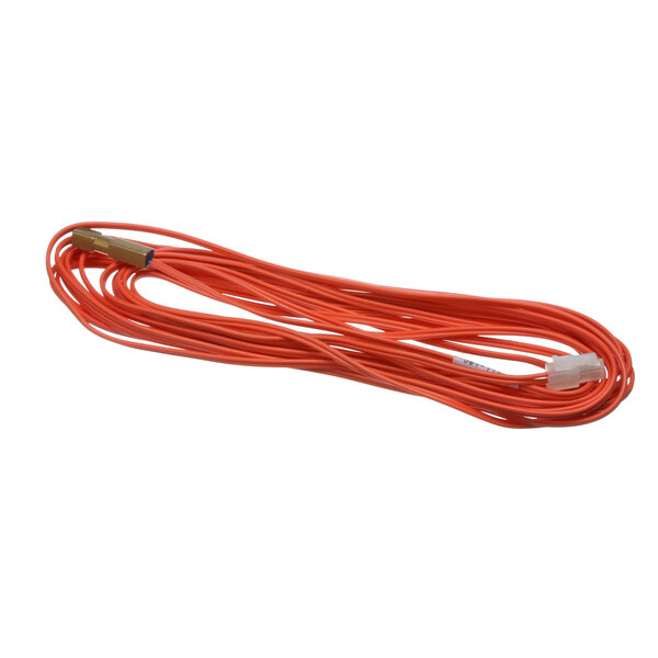 An orange cable attached to a white wire on a Structural Concepts 75385 Probe.