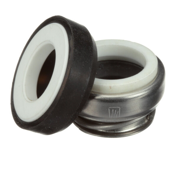 A close-up of a white and metal sliding seal with a black rubber ring.