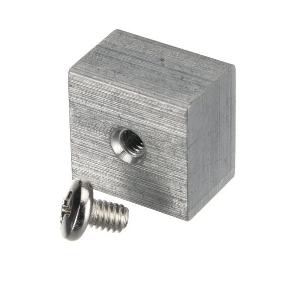 A metal cube with a screw on a square metal block.