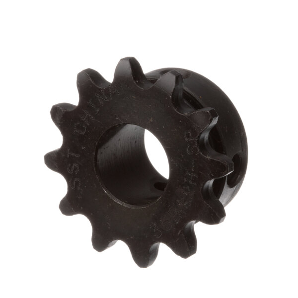 A close-up of a black Vulcan sprocket with a hole in it.
