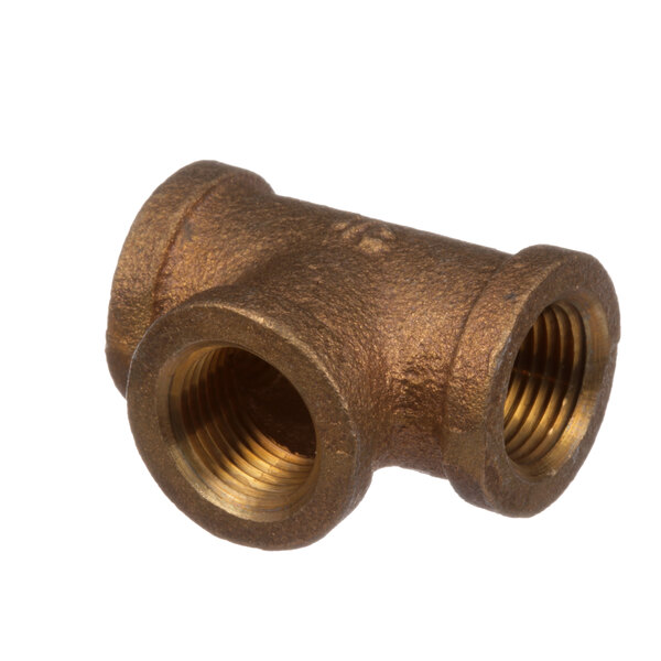 A close-up of a Groen brass pipe fitting with two nuts.