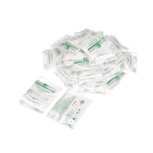 A pile of white and green packets with green text on plastic bags.