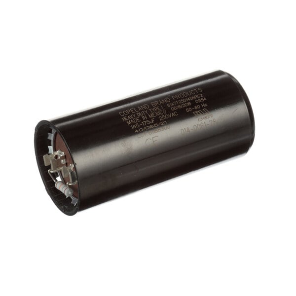 A close-up of a black round Master-Bilt capacitor.