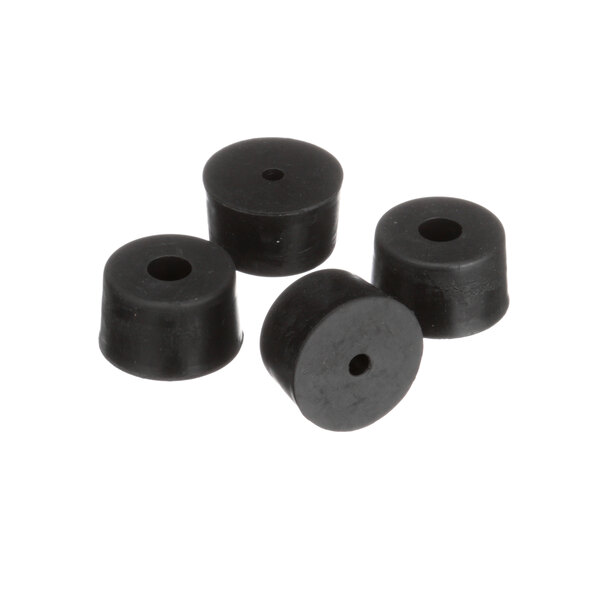 A set of four black rubber feet with holes in the center.