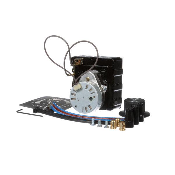 A black Cres Cor timer with a round metal disc and wires.