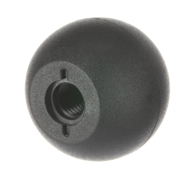 A close-up of a black round ball with a screw on it.