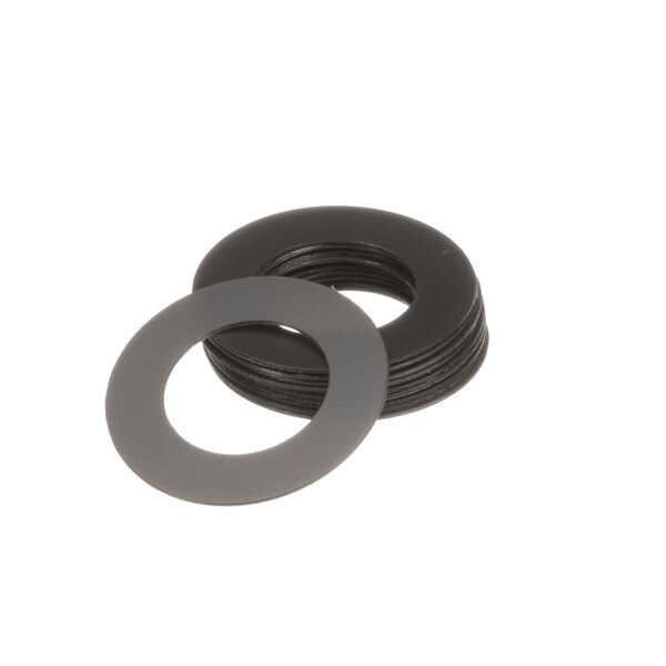 A stack of black rubber Frymaster washers.