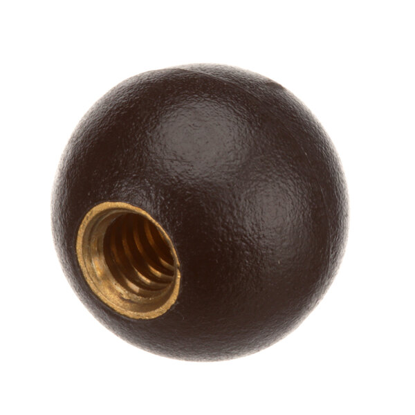 A round black Globe 1202 knob with a gold nut on it.
