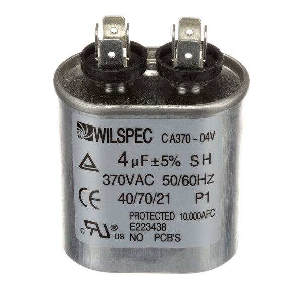 A round metal Traulsen run capacitor with black and white text on it.