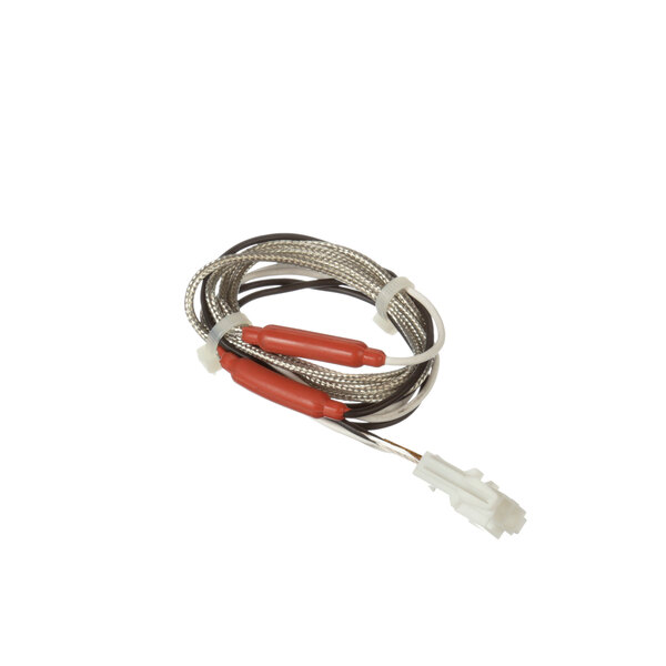 A Norlake drain heater wire with red and white connectors.
