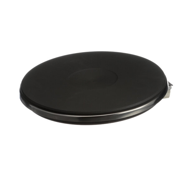 A black circular French plate with a silver border and metal handle.