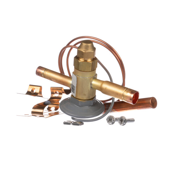 A copper Federal Industries expansion valve with a wire attached.