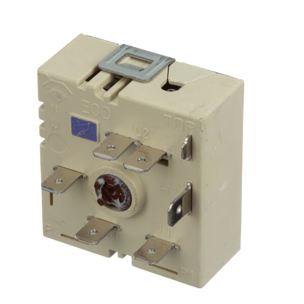 A white square Bakers Pride infinite switch with metal parts.