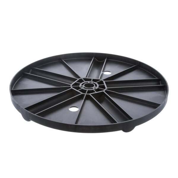 A black plastic circular disc with holes.
