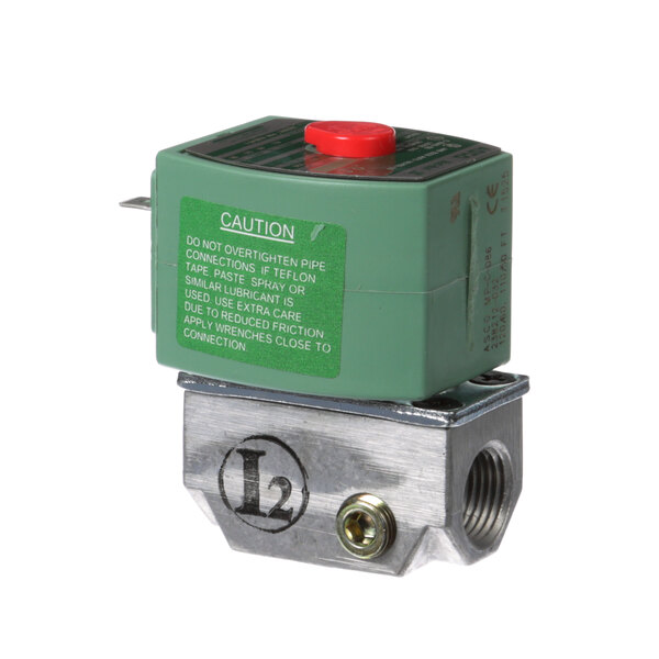 A green Vulcan solenoid with a red button.