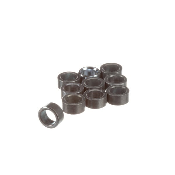 A close-up of a group of round black rubber rings with metal inside.