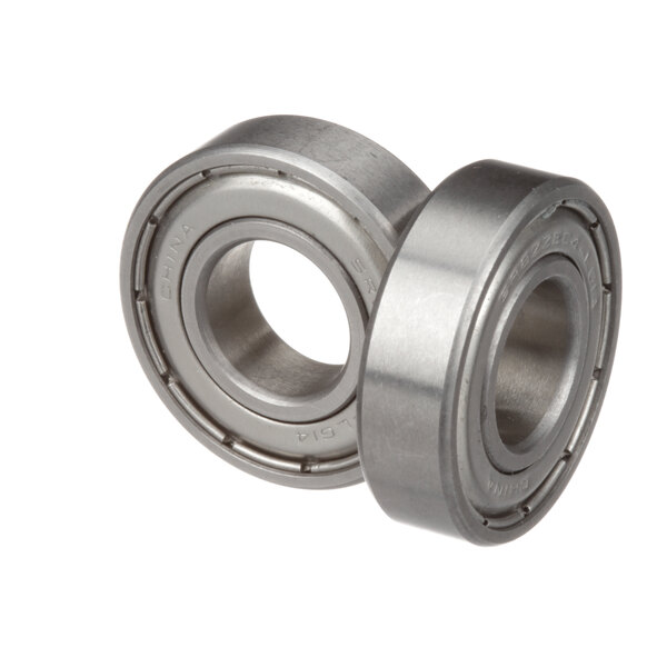 A close-up of two Antunes ball bearings.