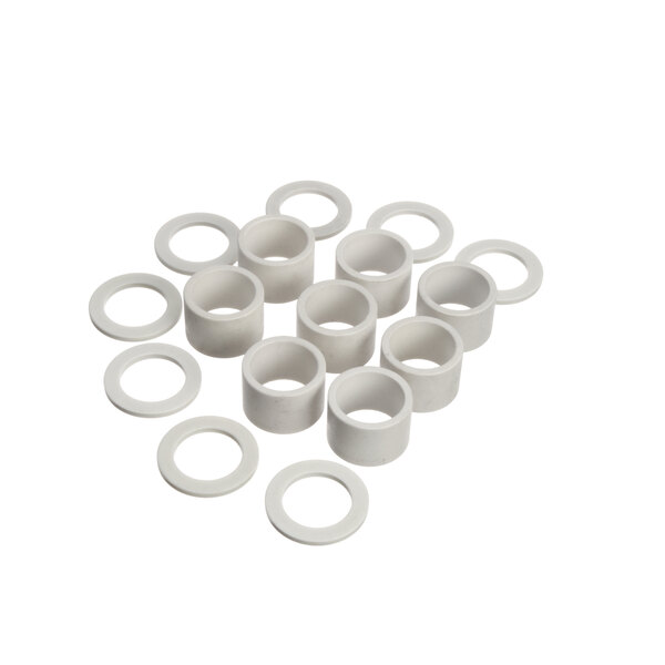 A set of white plastic circular bearings.