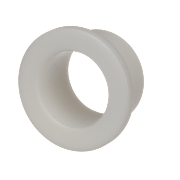 A white plastic circle with a hole in the center.