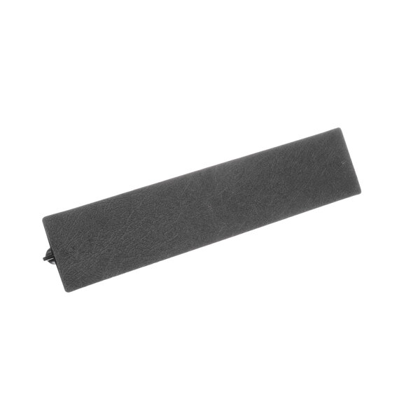 A grey rectangular rubber pad with a cord.