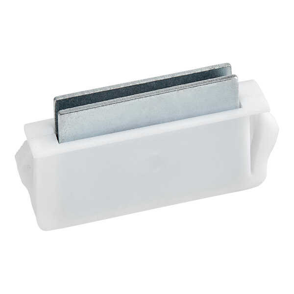 A white plastic rectangular door latch with a metal bar.