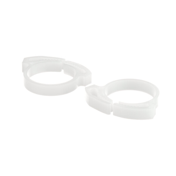 A pair of white plastic rings with a hole in the middle.