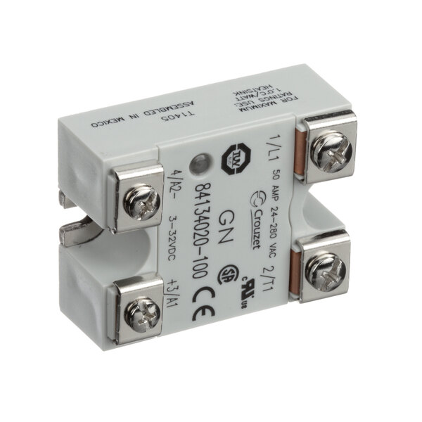 A white electrical relay with silver screws.