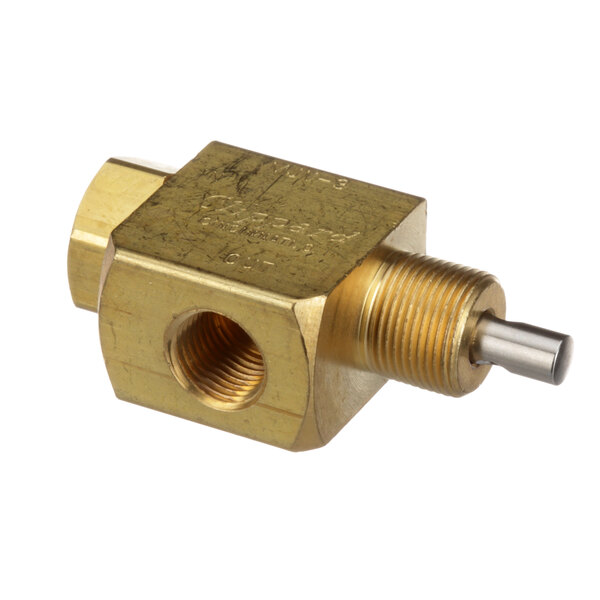 A close-up of an Edlund brass valve with a threaded nut.