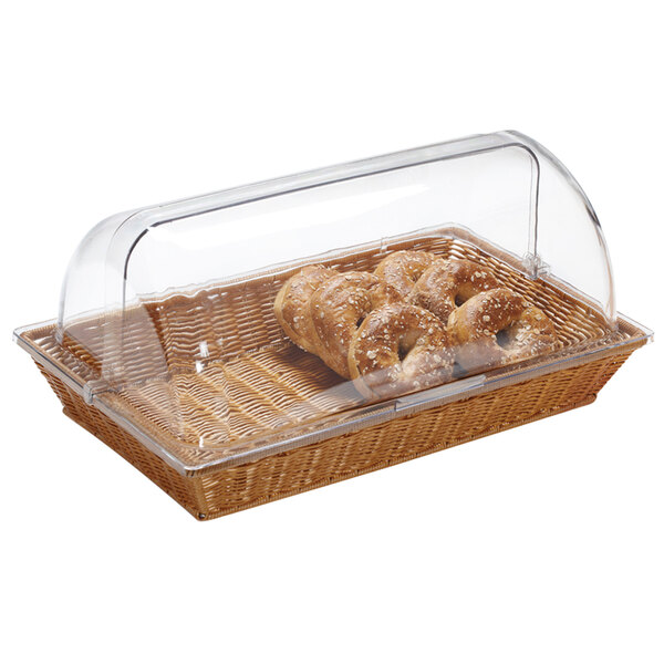 A honey rectangular plastic basket with bread inside.