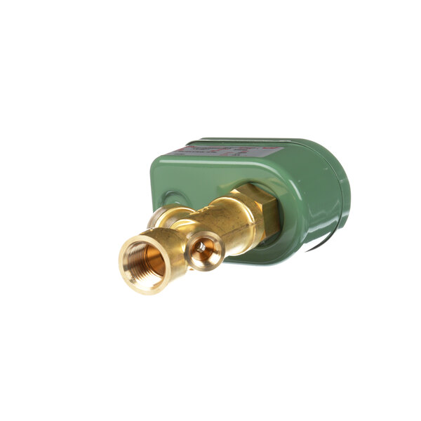 A green and gold Groen valve solenoid with brass fittings.