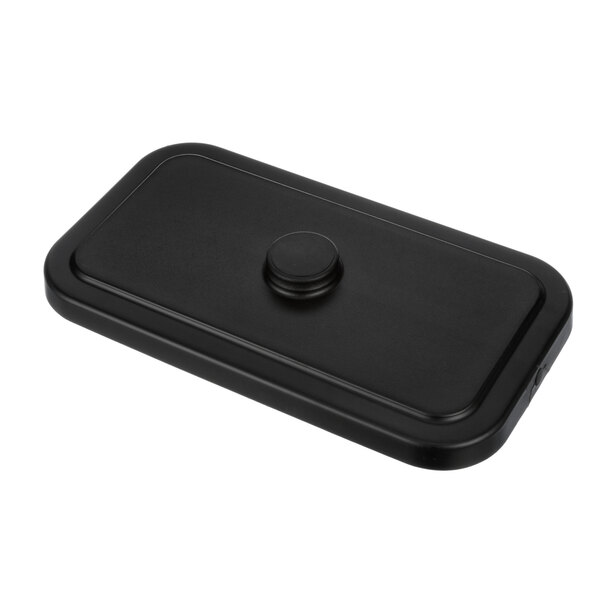 A black rectangular Taylor hopper cover with a button on top.