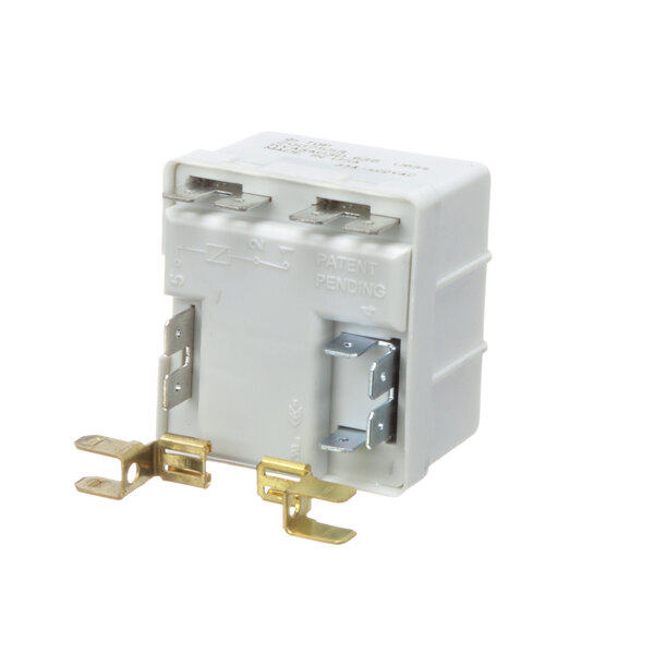 A white Manitowoc Ice start relay with metal parts and gold wires.