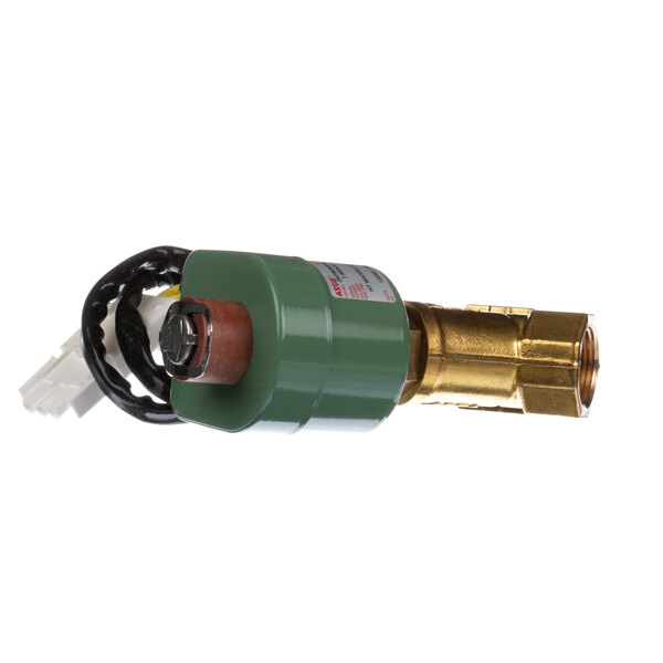 A green and gold Vulcan boiler blow valve.