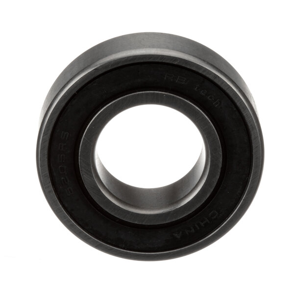 A close-up of a black rubber Univex ball bearing.