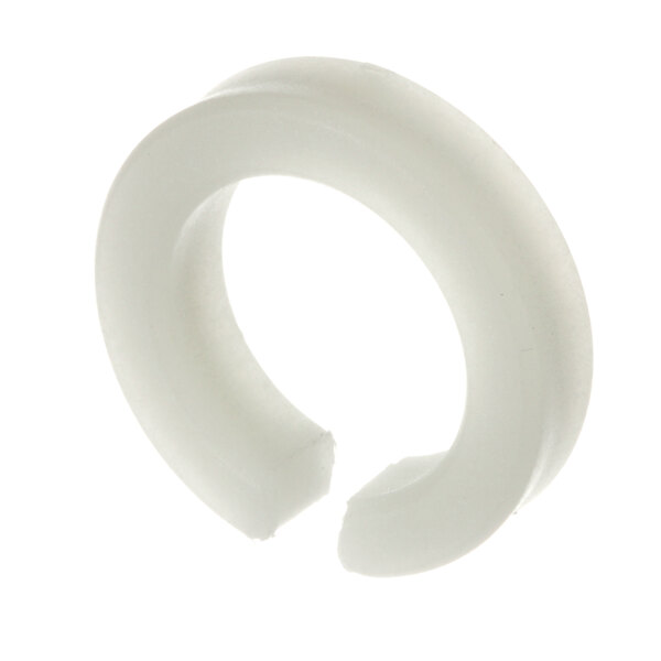 A white plastic ring with a hole in the middle.