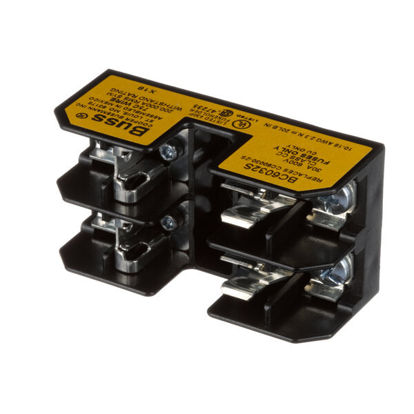 A black and yellow Cleveland 2-pole fuse block.