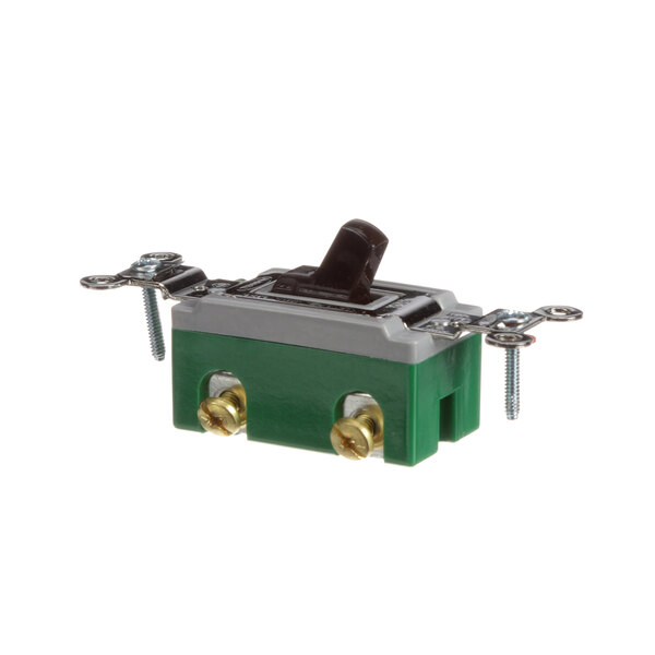 A green and silver Delfield toggle switch with screws on it.