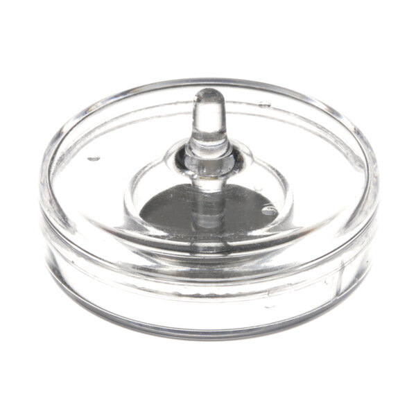 A clear plastic lid with a small hole over a clear plastic container.