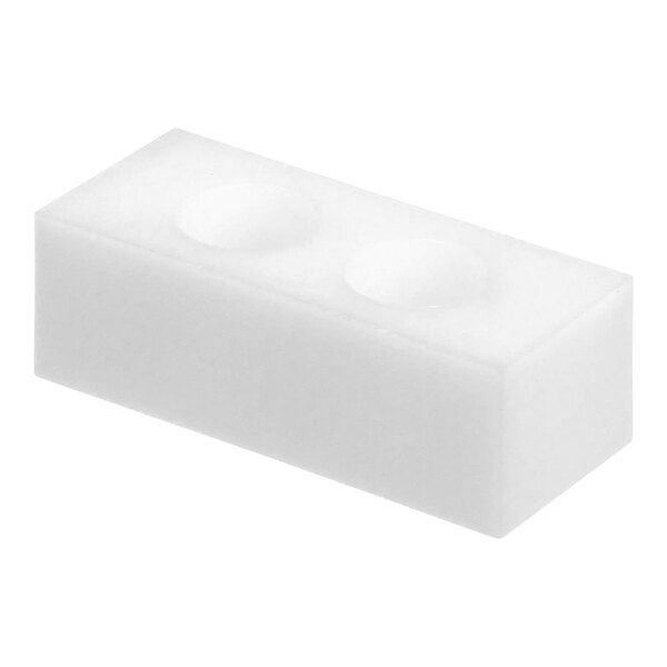 A white plastic Convotherm lock block with two holes.