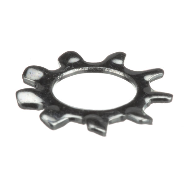 A close-up of a metal ring with gear teeth.