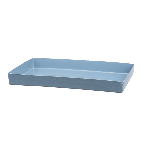 A blue rectangular Delfield drain pan with a handle.