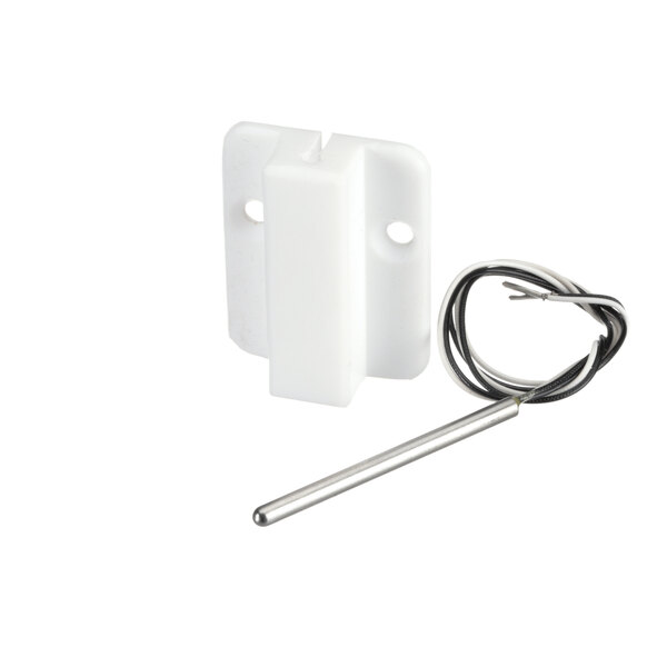 A white plastic piece with a wire.