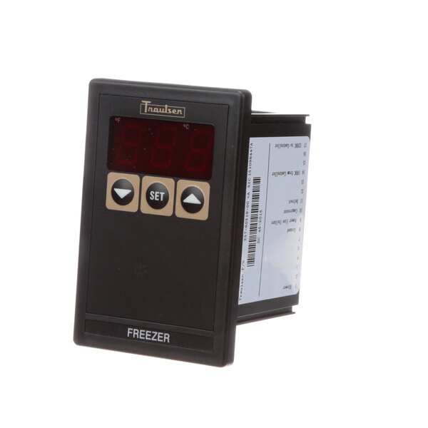 A Traulsen digital temperature controller with a white label on a black background.