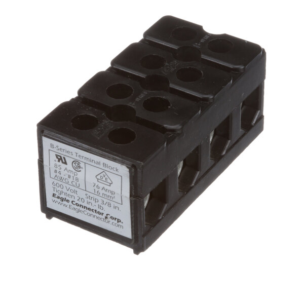 A black Groen electrical terminal block with four holes.