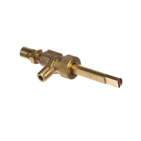 A brass US Range valve top burner with a gold connector and handle.