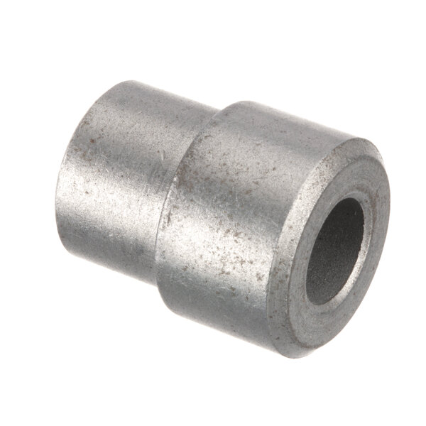 An Avtec metal bushing with a hole in a metal cylinder.