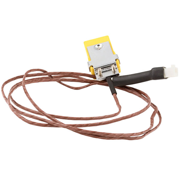 A close-up of an APW Wyott thermocouple wire with a yellow connector and brown and yellow wires.